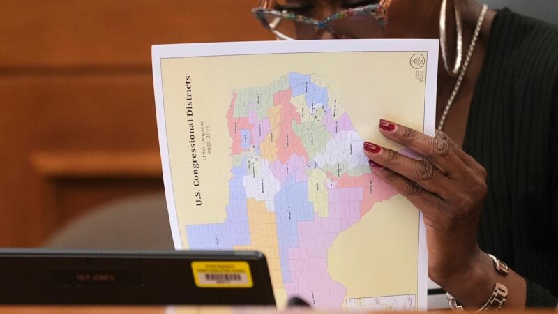 A person holding a district map.