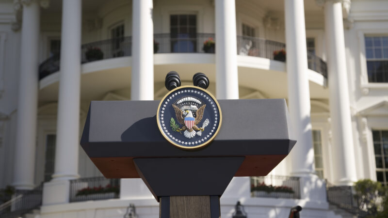 Presidential podium in front of the White House.