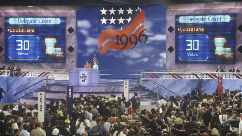 A 1996 party convention with a view of the crowd and the stage.