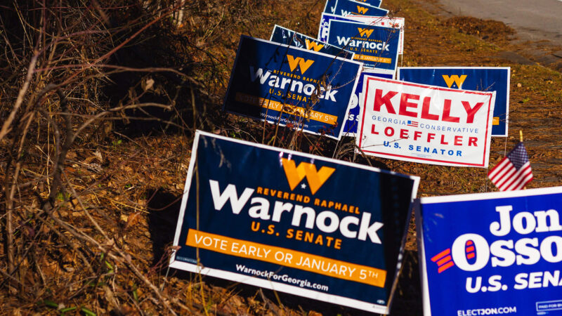 Campaign signs for the Georgia runoff elections