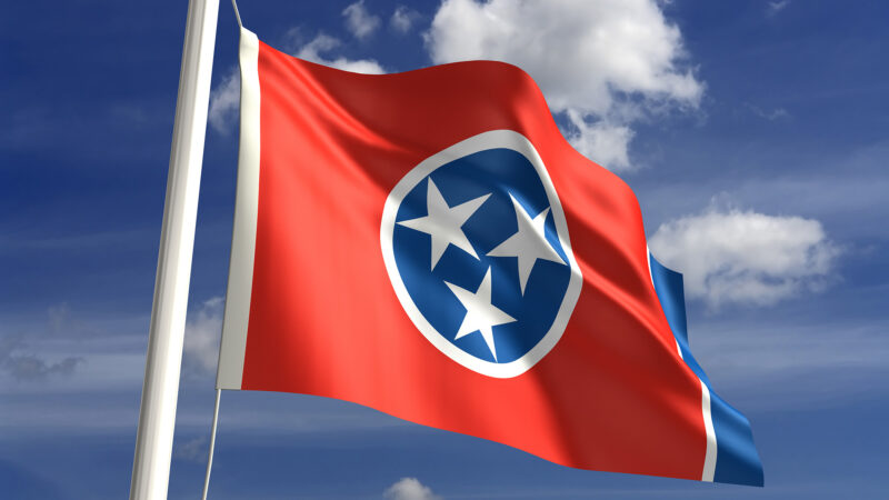 A Tennessee flag waving in the wind.