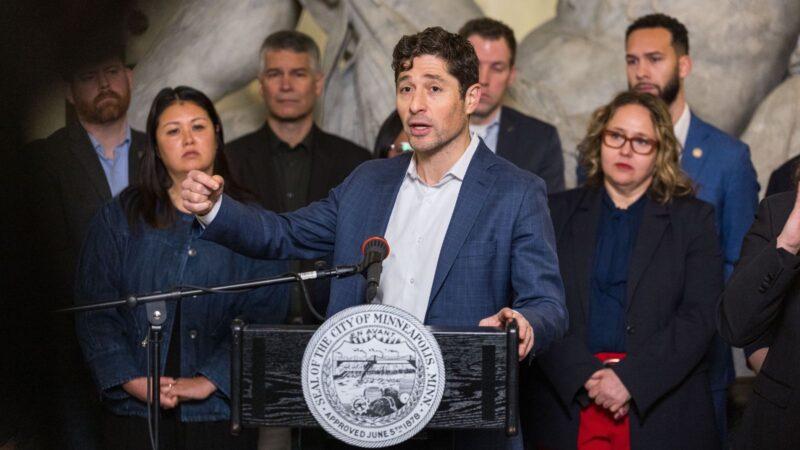 Jacob Frey speaking at a press conference in Minnesota.