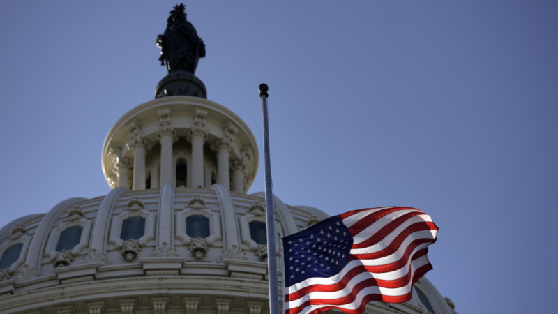 US Capitol Building with the American Flag