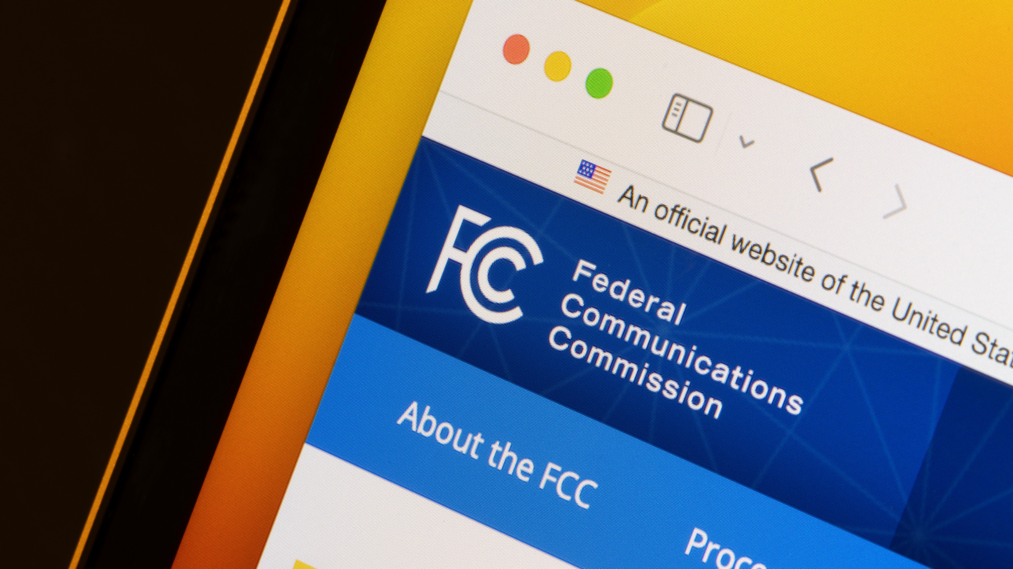 The FCC logo on a computer screen.