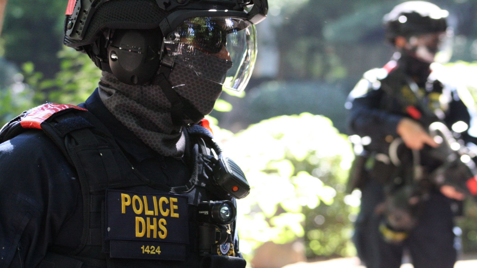 A federal agent in Portland in 2020 with a face mask.