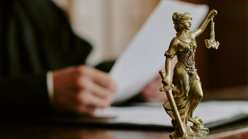 Lady justice sitting on a judge's desk