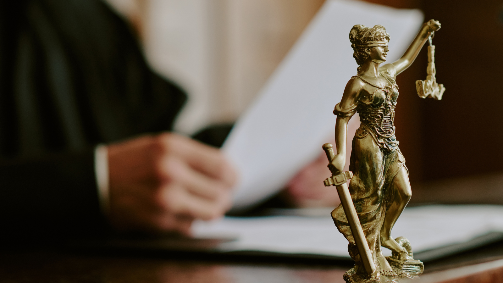 Lady justice sitting on a judge's desk