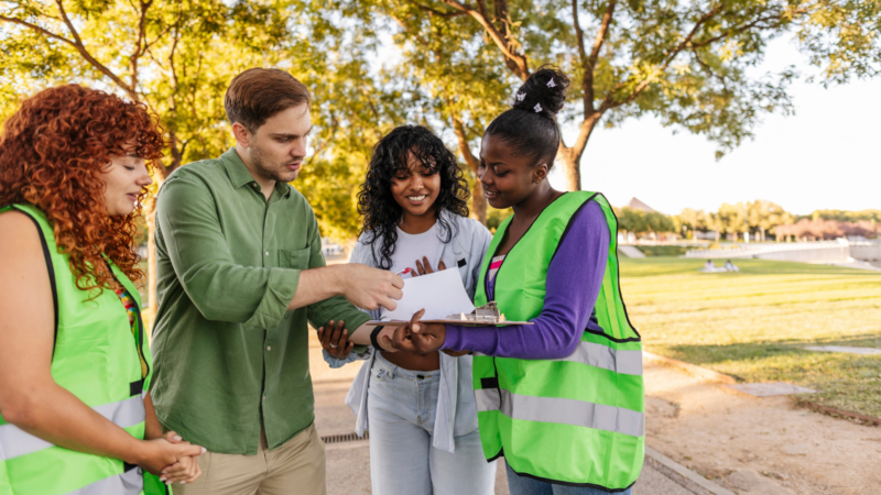 Volunteers asking people to sign a petition